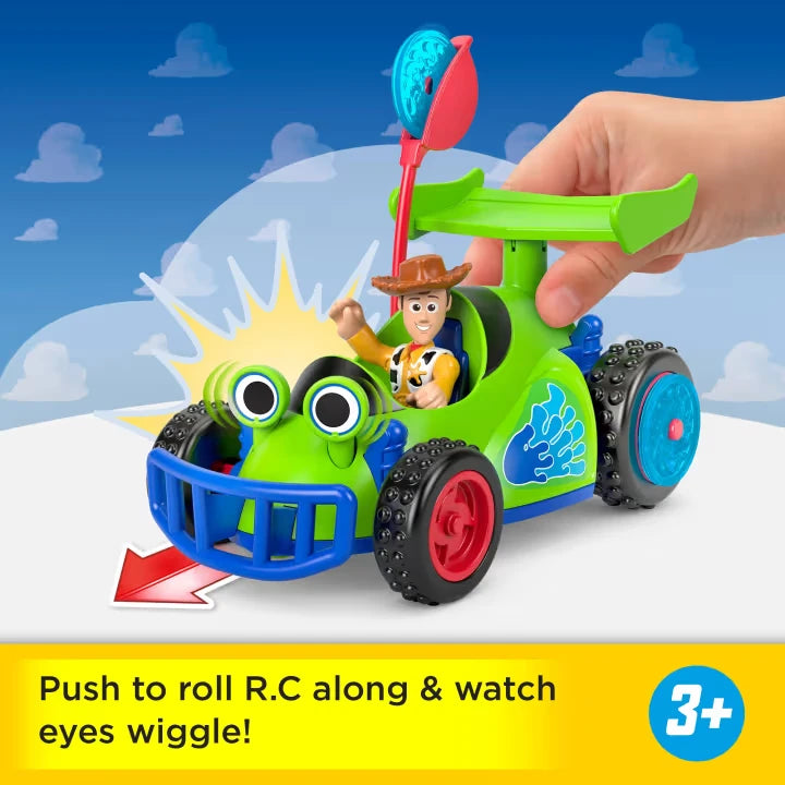 Imaginext Toy Story R.C. car with Woody figure seated inside and hand pushing the launcher handle