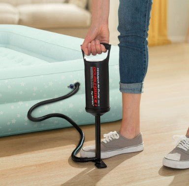 Intex Double Quick Hand Pump being used on inflatable bed – Ireland