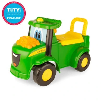 John Deere Johnny Tractor green ride on with yellow seat and Toy of the Year finalist badge