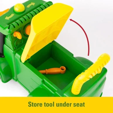 John Deere Johnny Tractor open seat storage containing orange screwdriver