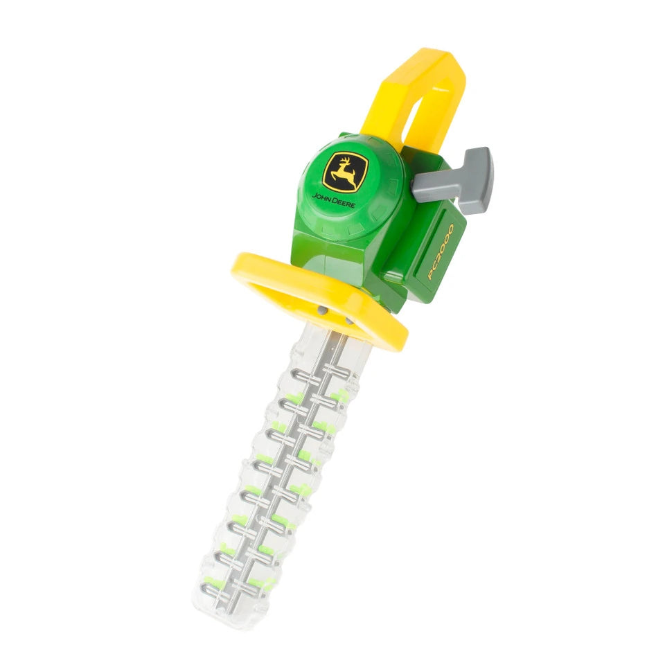 Green and yellow John Deere toy hedge trimmer with clear blade section showing green beads and John Deere logo on housing