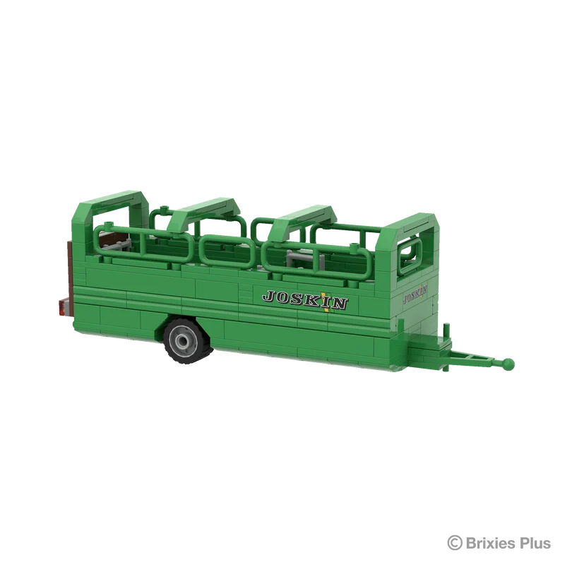 BRIXIES Plus Joskin Betimax viewed from the front side with the long drawbar, green body, JOSKIN logo and open rail structure clearly visible