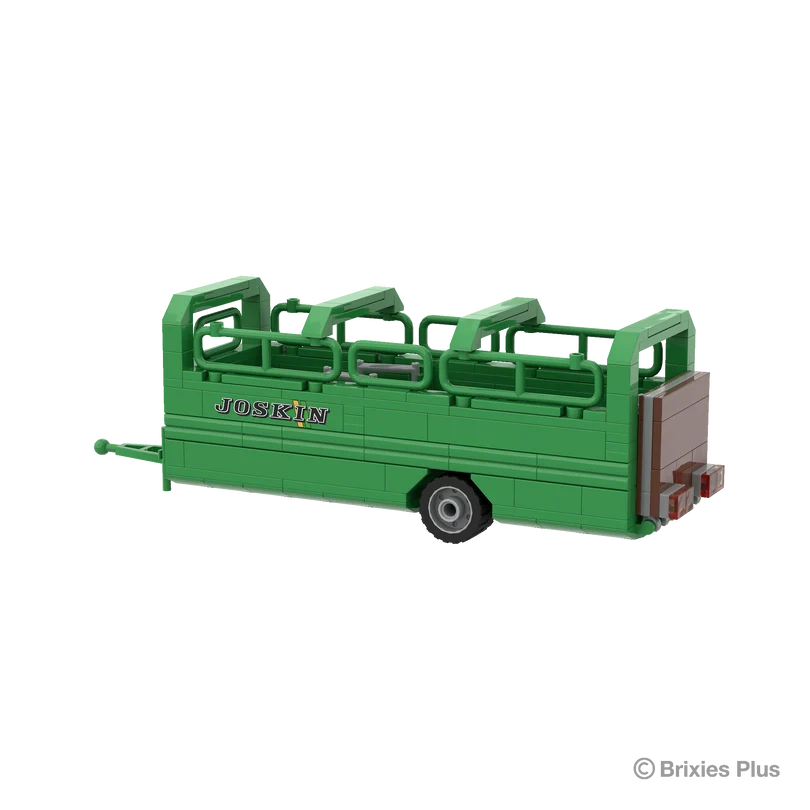 BRIXIES Plus Joskin Betimax viewed from the rear side showing the brown closed rear gate, rear lights, green livestock rails and drawbar