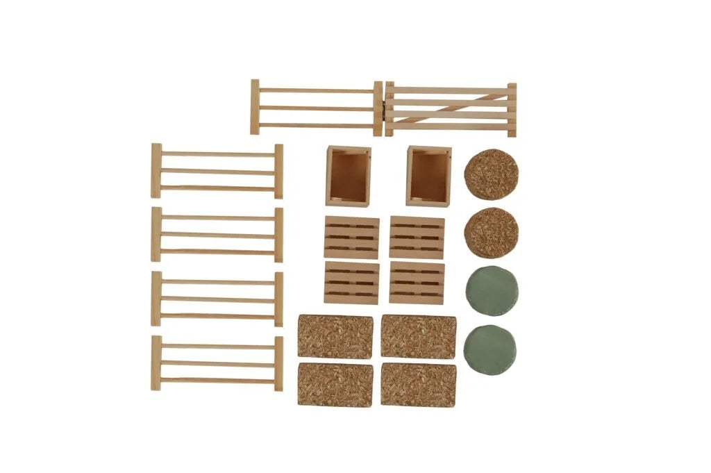 Flat lay of all 19 pieces in the Kids Globe Farming 1:32 Farm Accessory Set including fence sections, gate, two crates, two pallets, four square bales and four round bales
