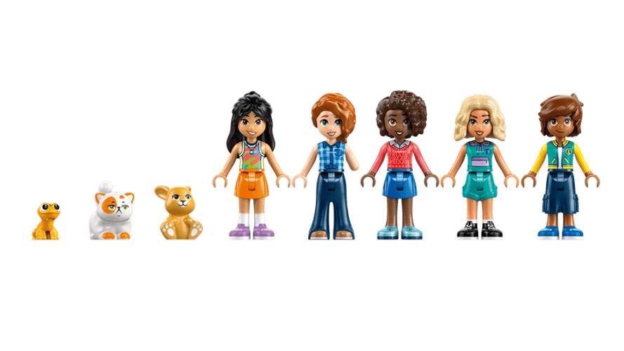 Five LEGO Friends minidolls from Heartlake City Friends Club House 42689 displayed alongside three animal figures including a gecko, white cat and brown bunny.