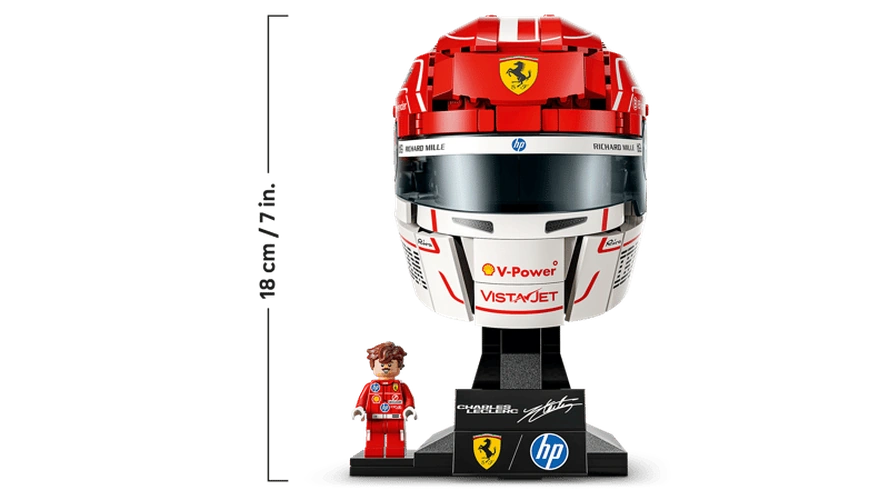 LEGO Editions Charles Leclerc Helmet 43014 displayed from the front with Ferrari badge, dark visor, signature plaque, minifigure and height measurement of 18 cm.