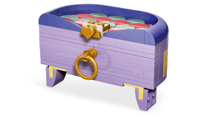LEGO storage box build with purple sides, patterned top, gold ring and heart detail