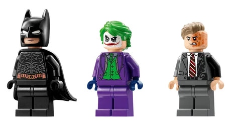 LEGO Batman minifigures of Batman The Joker and Two Face standing side by side on white background