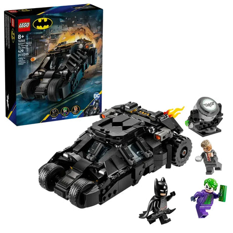 LEGO Batman Tumbler set with box Batmobile and minifigures of Batman The Joker and Two Face on white background