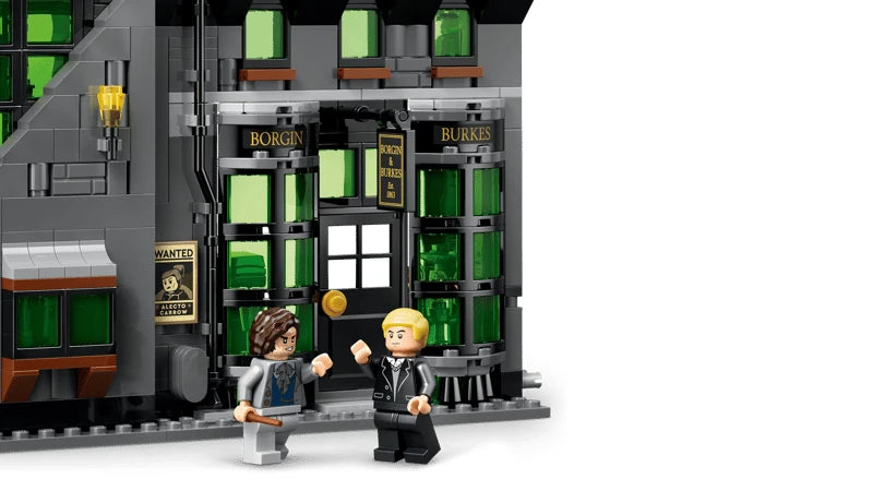 LEGO dark wizarding shop front with green windows, two minifigures and a street lamp
