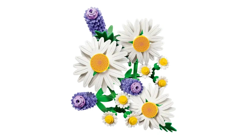 Overhead view of LEGO Botanicals Daisies bouquet showing white daisy flowers, lavender stems and green foliage arranged together on a white background