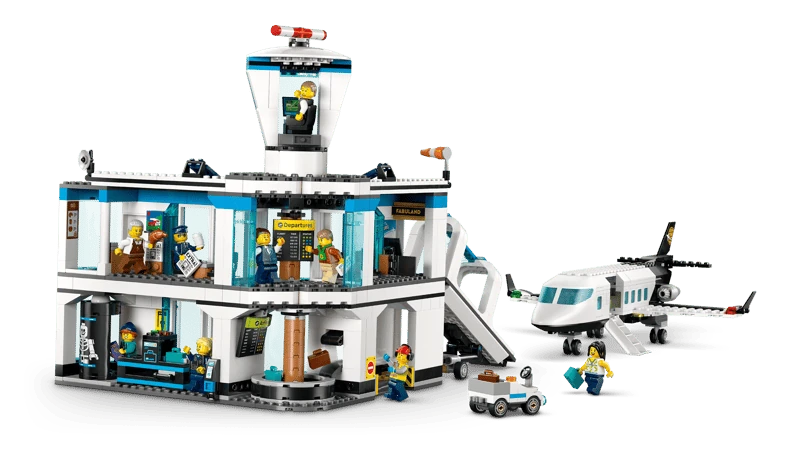 LEGO City airport terminal with passenger airplane, airport tug, jet bridge, minifigures and luggage