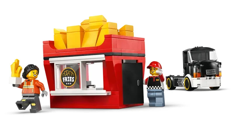 LEGO City fries food truck kiosk module with fries shaped roof shown beside two LEGO City minifigures and the detached truck cab
