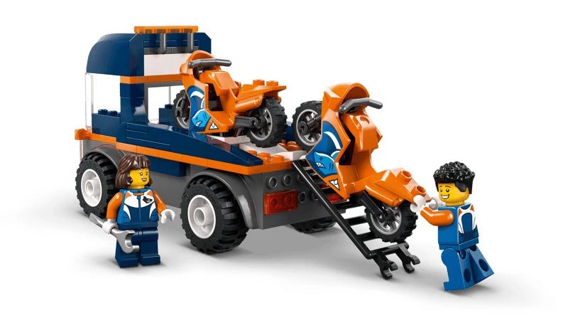 Rear view of LEGO City Motorcycle Transporter showing loading ramp lowered with two orange motorcycles and two minifigures