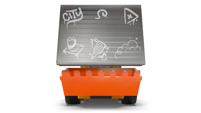 Front view of the LEGO City Rides construction loader with the front bucket facing forward and a grey panel raised above the bucket showing light gray graffiti line drawings