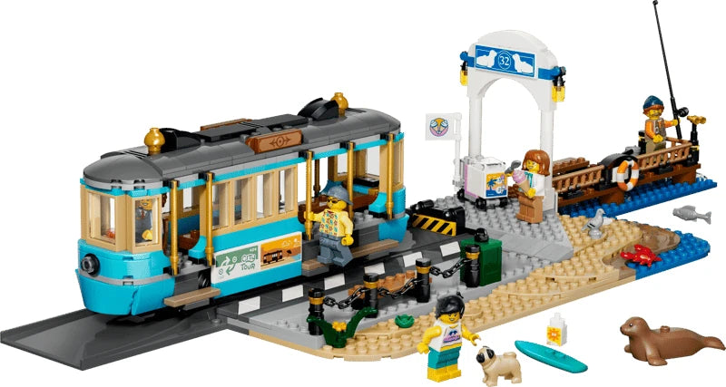 LEGO City beach streetcar set with station, pier, ice cream stand, minifigures, surfboard and seal figure