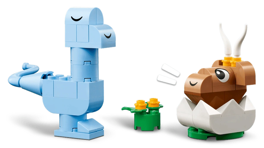 LEGO Classic Creative Dinosaurs blue long-neck dinosaur beside a brown baby dinosaur hatching from a white egg and yellow flowers