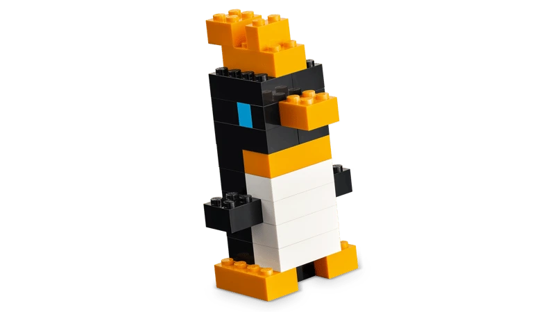 LEGO penguin build with black, white, orange and blue bricks
