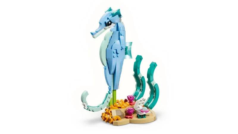 LEGO Creator 3 in 1 Sea Animals Beautiful Dolphins seahorse model shown on white background with stand and seaweed