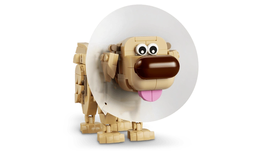 LEGO Disney Dug dog figure wearing a large white protective cone around his neck, showing his tan body, brown nose, wide eyes and pink tongue.
