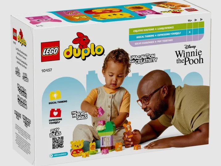 Child playing with LEGO DUPLO Winnie the Pooh Birthday Party set – ToyTown.ie