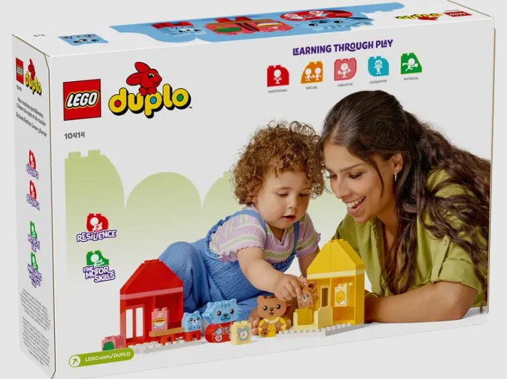 Parent and child playing with LEGO DUPLO Daily Routines 10414 toy set