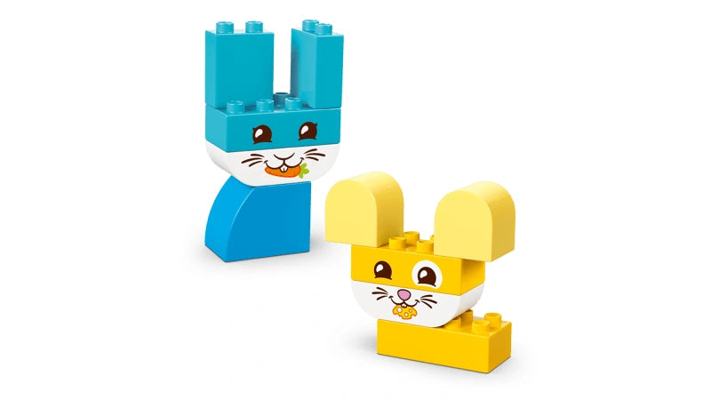Assembled LEGO DUPLO pet figures including a blue rabbit and yellow mouse with printed faces displayed together on a white background