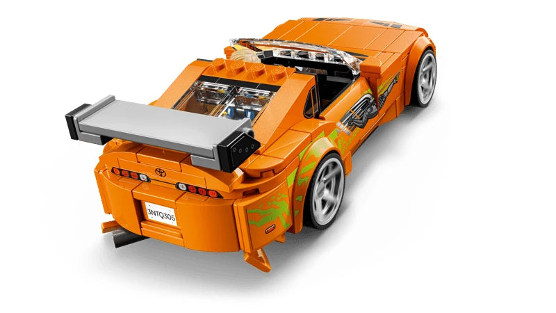 Rear view of LEGO orange Toyota Supra car with grey rear wing