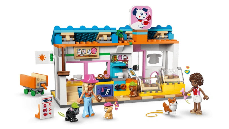 LEGO Friends Dog Treats Bakery 42677 bakery build shown open with Aliya and Sage minidolls and four dog figures