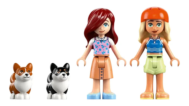 LEGO Friends minidolls Paisley and Sage with two corgi figures on a white background