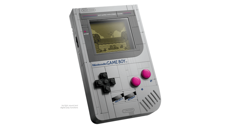 Angled close-up of the LEGO Nintendo Game Boy model showing the screen, magenta A and B buttons, D-pad and front console details