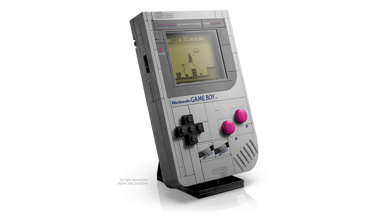 LEGO Nintendo Game Boy model on black display stand with an angled front view and a platform game scene shown on the screen