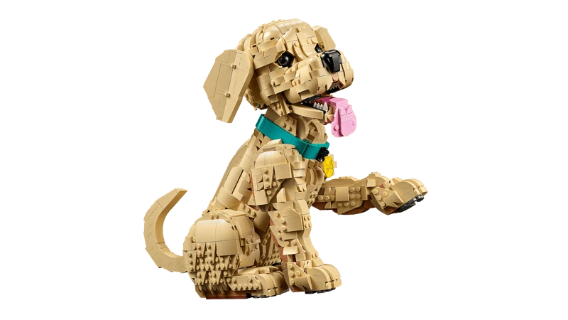 LEGO Golden Retriever Puppy model in side view with one front paw raised and pink tongue showing