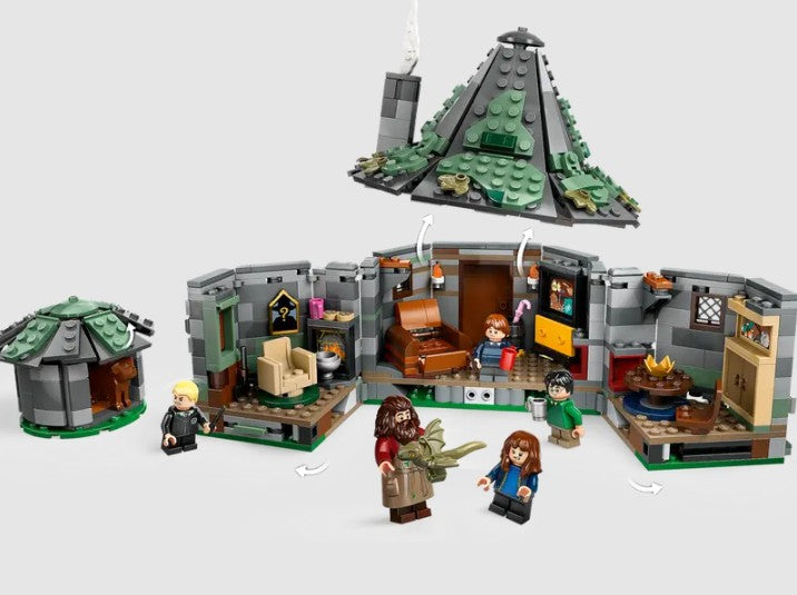 Open interior of LEGO Hagrid’s Hut with furniture and minifigures