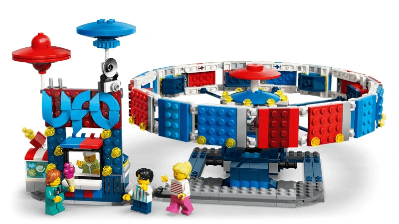 Side view of LEGO UFO ride with ticket booth, minifigures and blue circular ride platform
