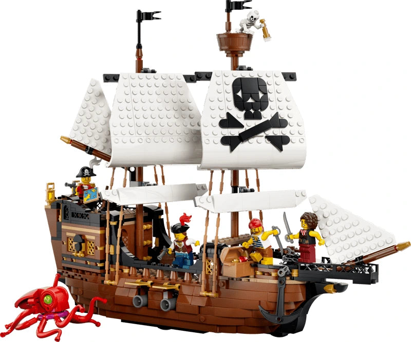LEGO pirate ship with white skull sails, pirate minifigures, skeleton lookout and red sea monster