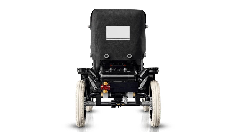 Rear view of the LEGO Icons Ford Model T showing the black fabric roof, rear light, axle details and white tyres