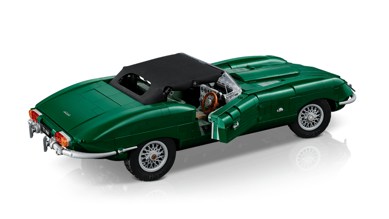 Rear three quarter view of the LEGO Icons Jaguar E-Type 11381 with the black textile roof raised
