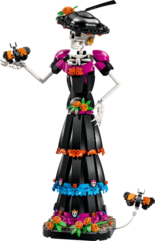 Completed LEGO Ideas La Catrina 21372 display figure with a decorated hat, floral dress and orange butterflies