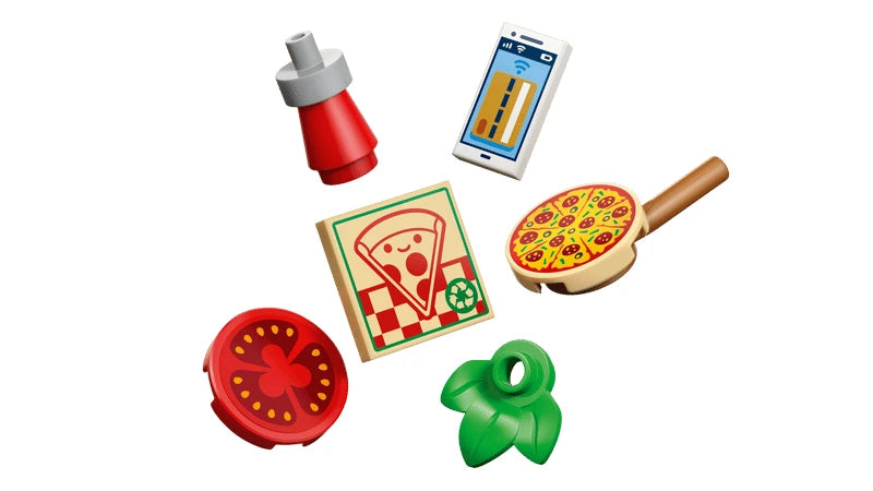 LEGO pizza toppings, pizza peel, menu tile, sauce bottle and small green accessory