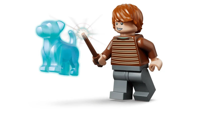 LEGO red-haired minifigure holding a wand beside a blue dog figure