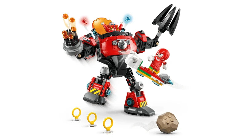 LEGO Egg Crusher Mech with Dr. Eggman in the cockpit, Knuckles on the white board, three Gold Rings and a brown boulder