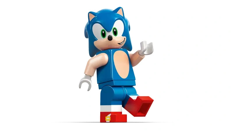 LEGO Sonic minifigure standing alone with raised hand, blue body, tan chest detail and red shoes on a white background