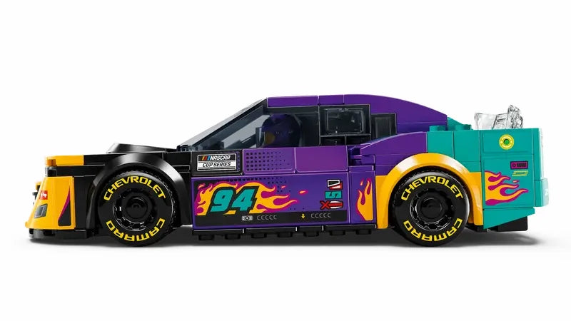 Side profile of LEGO Speed Champions NASCAR Next Gen Chevrolet Camaro ZL1 showing flame graphics, spoiler and wheels in Ireland.