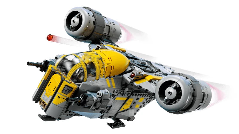 Three quarter front view of the LEGO Star Wars The Razor Crest in flight with red projectiles firing from the stud shooters
