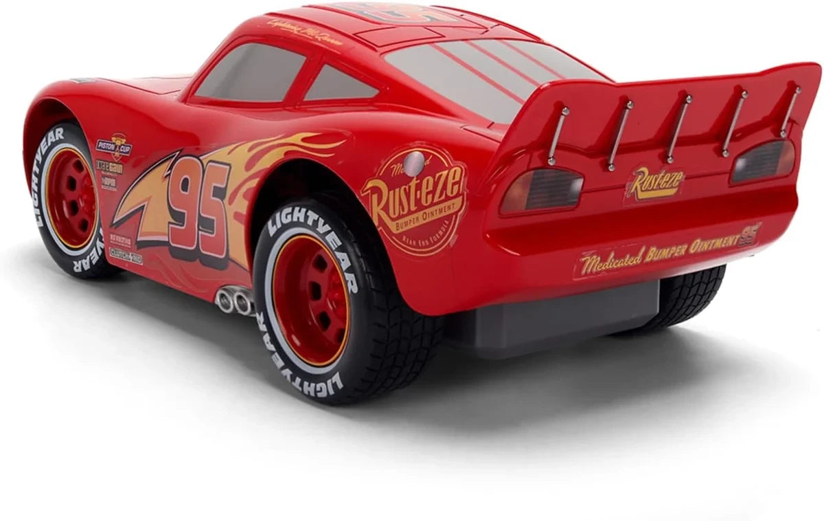 Lightning McQueen Animated RC viewed from the rear and side, showing the red rear spoiler, Rust-eze logos, number 95 racing graphics and Lightyear tyres.