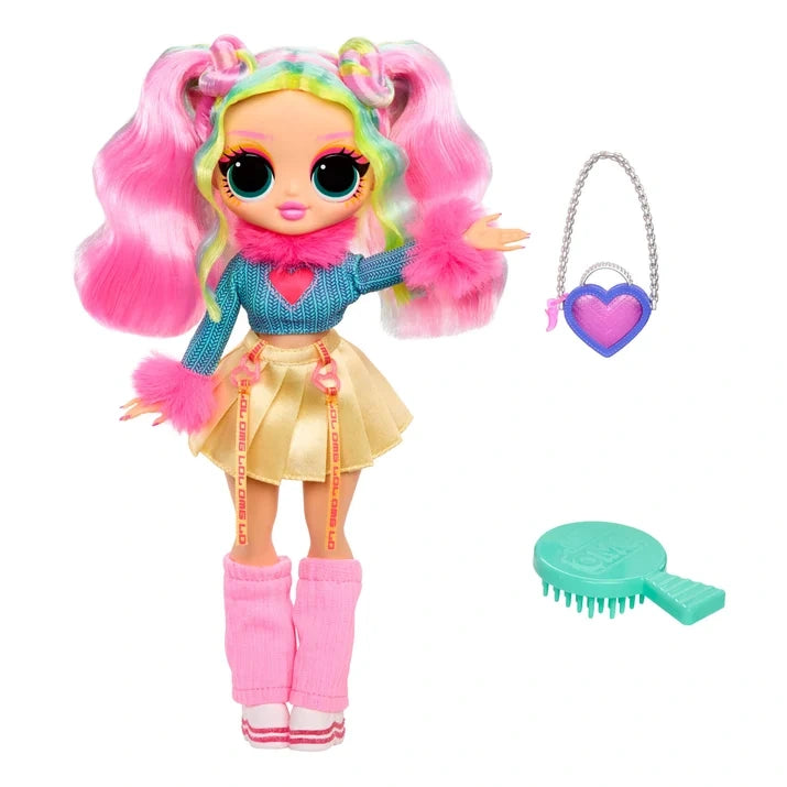 L.O.L. Surprise O.M.G. Bubblegum D.J. doll standing on a white background with one arm raised, wearing her turquoise and pink top, gold skirt and pink leg warmers. Her heart shaped handbag and mint green hairbrush are displayed separately beside her.