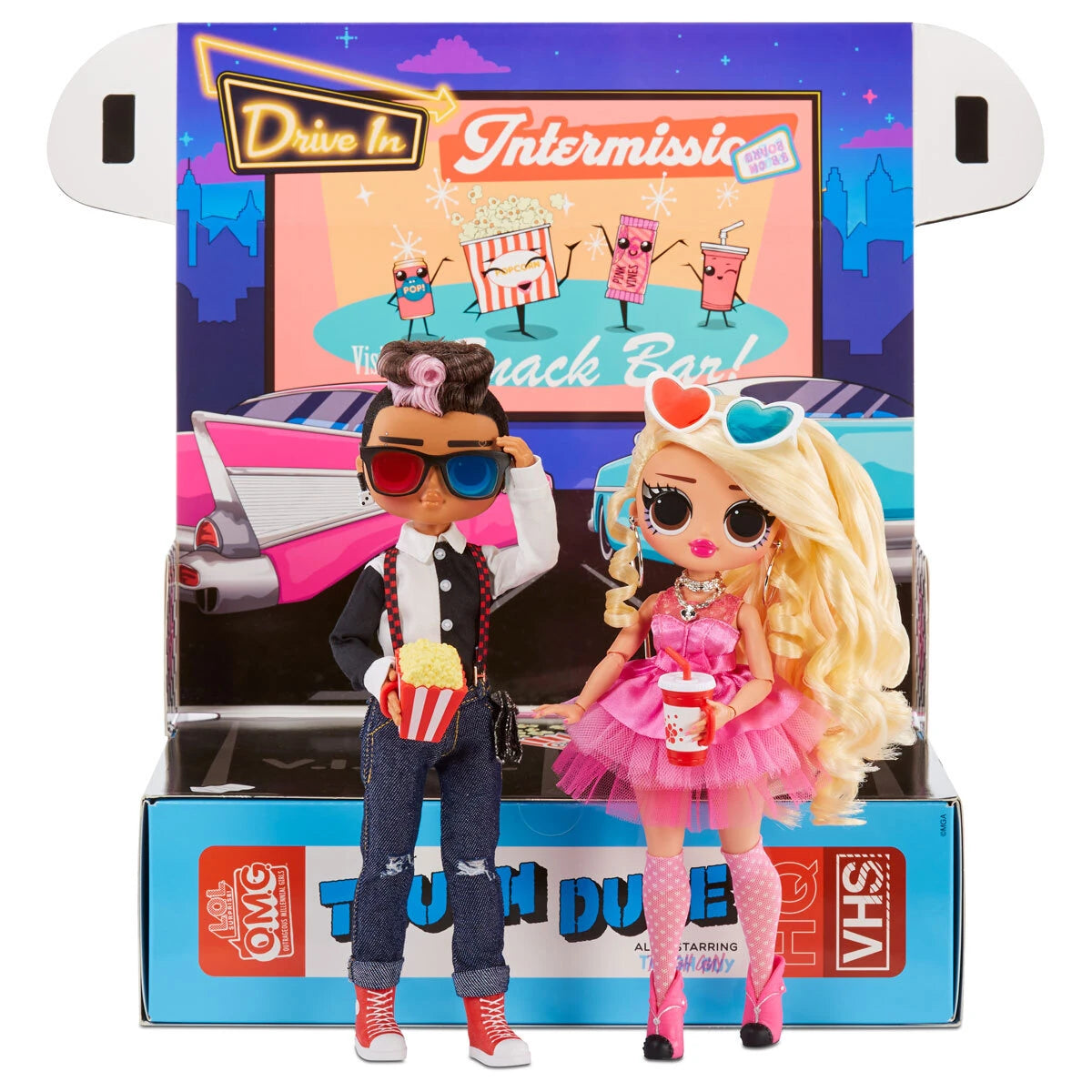 Tough Dude and Pink Chick dolls standing in front of the opened movie backdrop playset