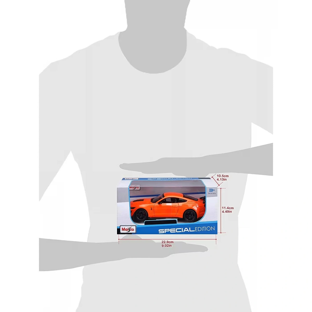 Maisto 2020 Ford Mustang Shelby GT500 retail box shown against a person for size reference