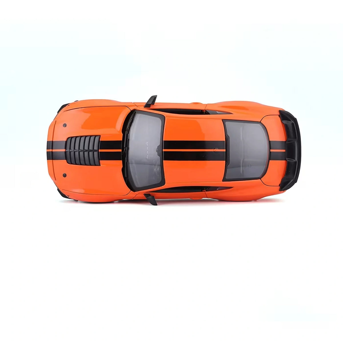 Maisto 2020 Ford Mustang Shelby GT500 top view showing orange bodywork and twin black racing stripes